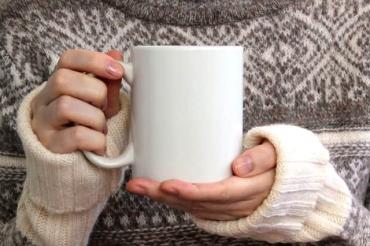 woman holding mug