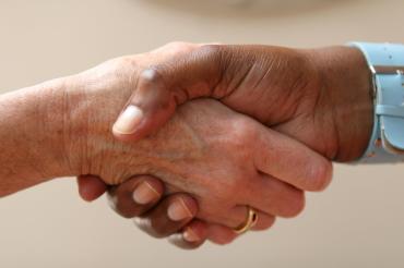 Hand shake between male & female