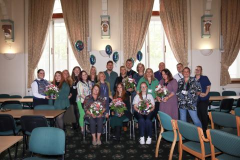 Andria Birch front centre with team at Volunteer Awards